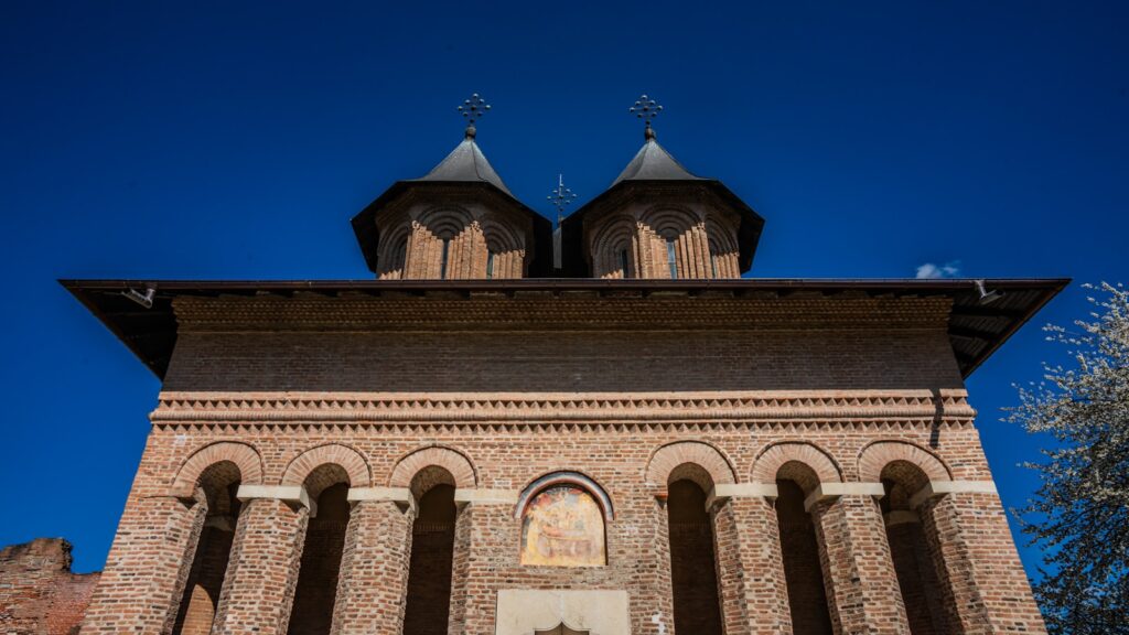 A tall tower with a clock on top of it