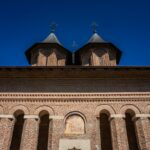 A tall tower with a clock on top of it