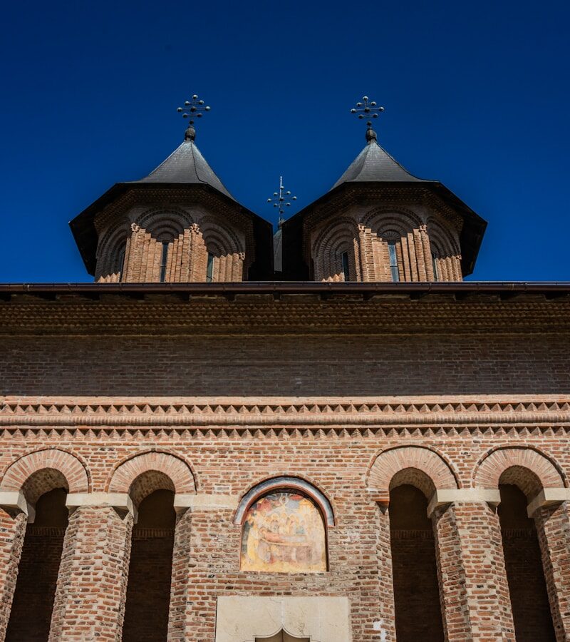 A tall tower with a clock on top of it