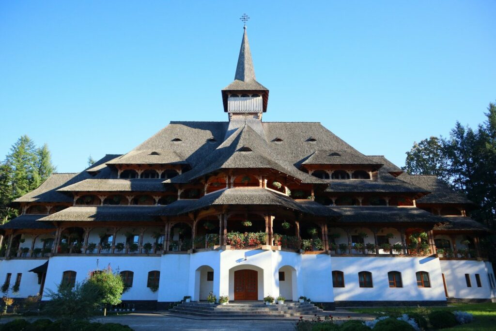 A large white building with a clock tower